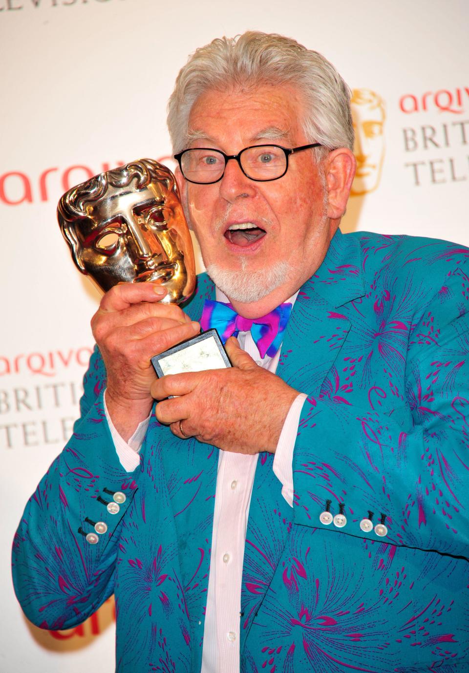 Winner of the Fellowship award Rolf Harris at the BAFTA TV Awards on Sunday, May 27, 2012, in London. (Photo by Jon Furniss/Invision/AP)