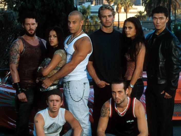 Matt Schulze, Chad Lindberg, Michelle Rodriguez, Vin Diesel, Paul Walker Johnny Strong, Jordana Brewster, and Rick Yune are seen in a publicity portrait for the film &quot;The Fast And The Furious&quot; in 2001.