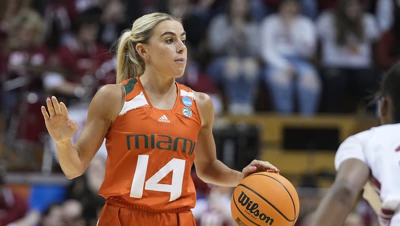 Miami’s Haley Cavinder dribbles during a college basketball game against Indiana in the women’s NCAA Tournament Monday, March 20, 2023, in Bloomington, Ind.