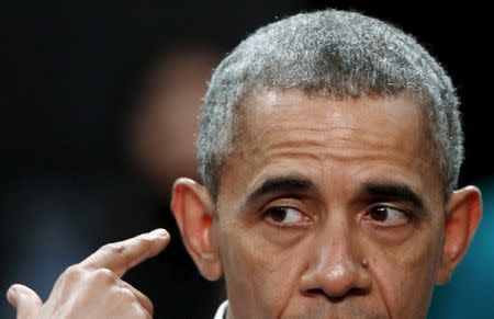 U.S. President Barack Obama participates in a town hall meeting with Young Southeast Asian Leaders Initiative (YSEALI) attendees at Taylor's University in Kuala Lumpur, Malaysia November 20, 2015, before attending the ASEAN summit meeting. During the event, Obama chided some of his fellow world leaders for coloring their hair to look young. REUTERS/Jonathan Ernst