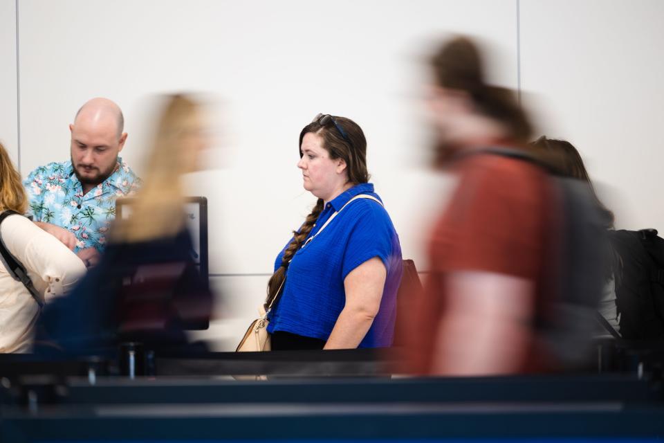 Travelers wait in line for security at the Salt Lake City International Airport in Salt Lake City on Friday, May 19, 2023. | Ryan Sun, Deseret News