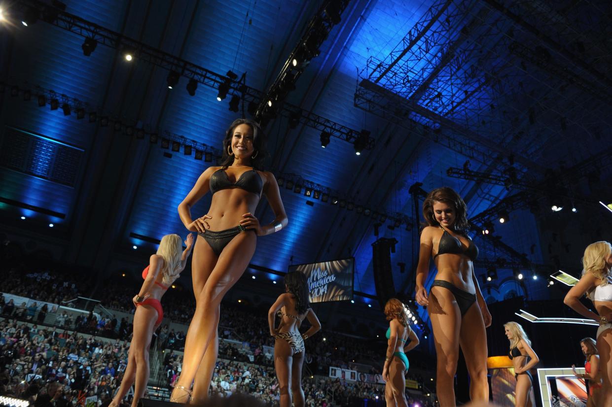 Miss America 2014 contestants perform in the bathing suit portion of the 2014 Miss America Competition at Boardwalk Hall Arena on Sept. 15, 2013, in Atlantic City, New Jersey.