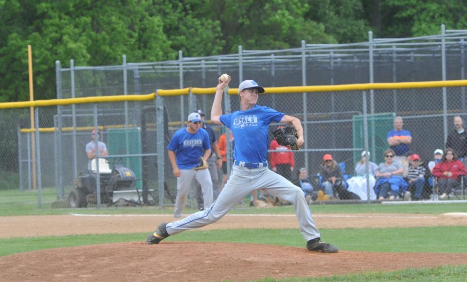 Wynford's Sam Collene delivers a pitch against Edison.