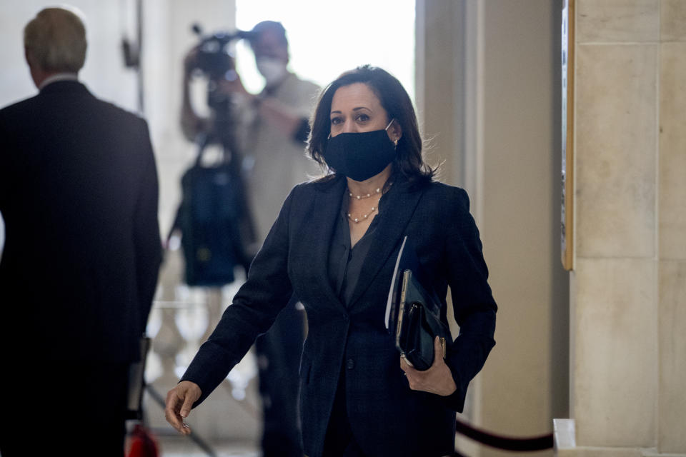 Sen. Kamala Harris, D-Calif., arrives as the Senate Homeland Security and Governmental Affairs committee meets on Capitol Hill in Washington, Wednesday, May 20, 2020, to issue a subpoena to Blue Star Strategies. (AP Photo/Andrew Harnik)