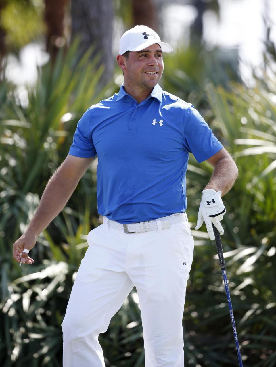 Gary Woodland reacts after teeing off the second tee during the final round of the Honda Classic golf tournament, Sunday, Feb. 26, 2017, in Palm Beach Gardens, Fla. (AP Photo/Wilfredo Lee)