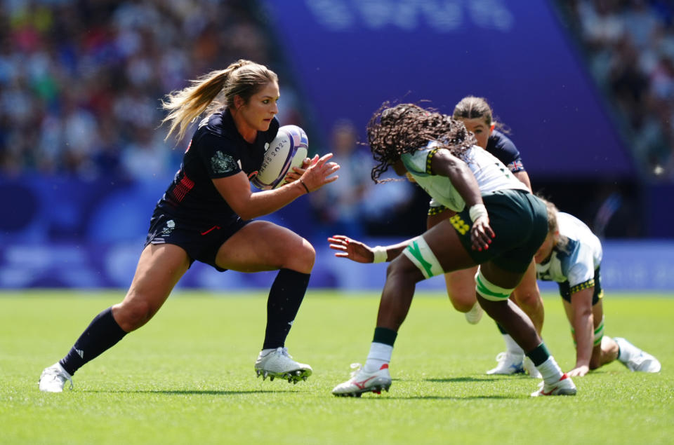 Great Britain's Amy Wilson-Hardy (left) in action against South Africa during the women's rugby sevens match at Stade de France on the third day of the 2024 Paris Olympic Games in France. Picture date: Monday July 29, 2024. (Photo by Mike Egerton/PA Images via Getty Images)