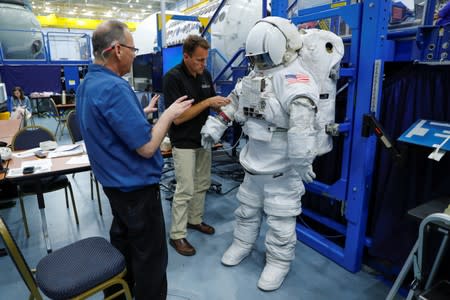 NASA Commercial Crew Astronaut Josh Cassada goes through a space suit fitting session at the Johnson Space Center in Houston,