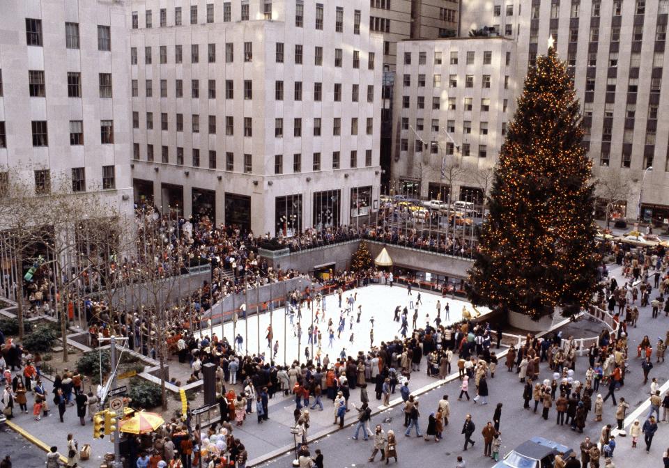 The Christmas tree towers over the ice skating rink at Rockefeller Center in New York City on Christmas Day, Dec. 25, 1979.