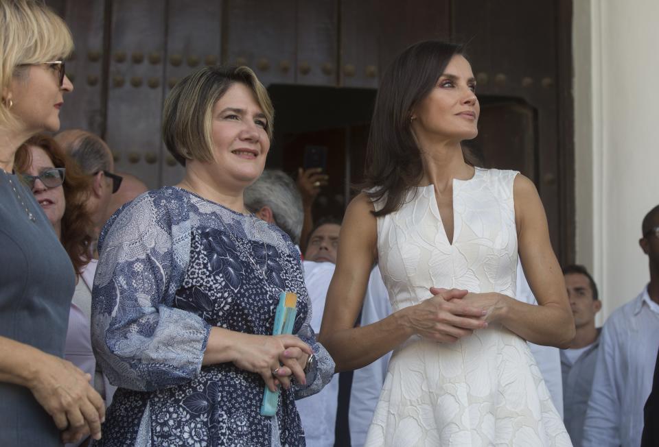 Spain's Queen Letizia, right, and Lis Cuesta Peraza, wife of Cuba's President Miguel Diaz-Canel, walk in Old Havana, Cuba, Tuesday, Nov. 12, 2019. (AP Photo/Ismael Francisco, Pool)