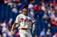 Philadelphia Phillies staring pitcher Hans Crouse watches a solo home run hit by Pittsburgh Pirates' Cole Tucker during the first inning of a baseball game, Sunday, Sept. 26, 2021, in Philadelphia. (AP Photo/Derik Hamilton)