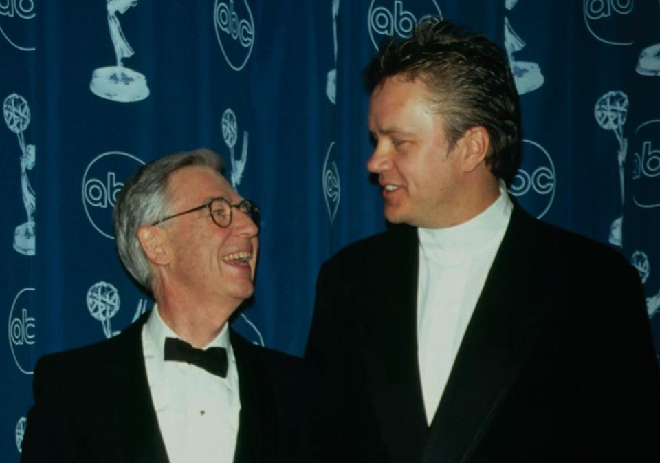 Actor Tim Robbins presented Rogers with the Lifetime Achievement Award at the 1997 Emmys. (Photo: Time & Life Pictures via Getty Images)