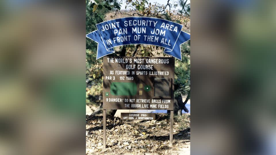 A sign spells out the hazards of playing golf at Camp Bonifas. - Paul Barker/X00020