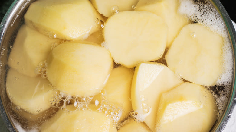 Potatoes boiling in a pot