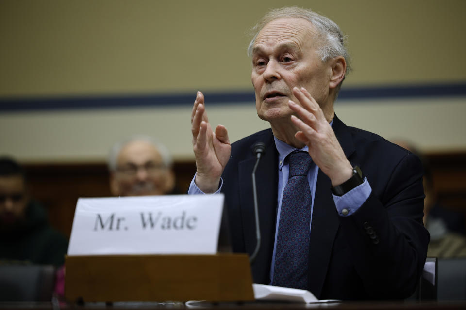 Author Nicholas Wade testifies before a House panel.