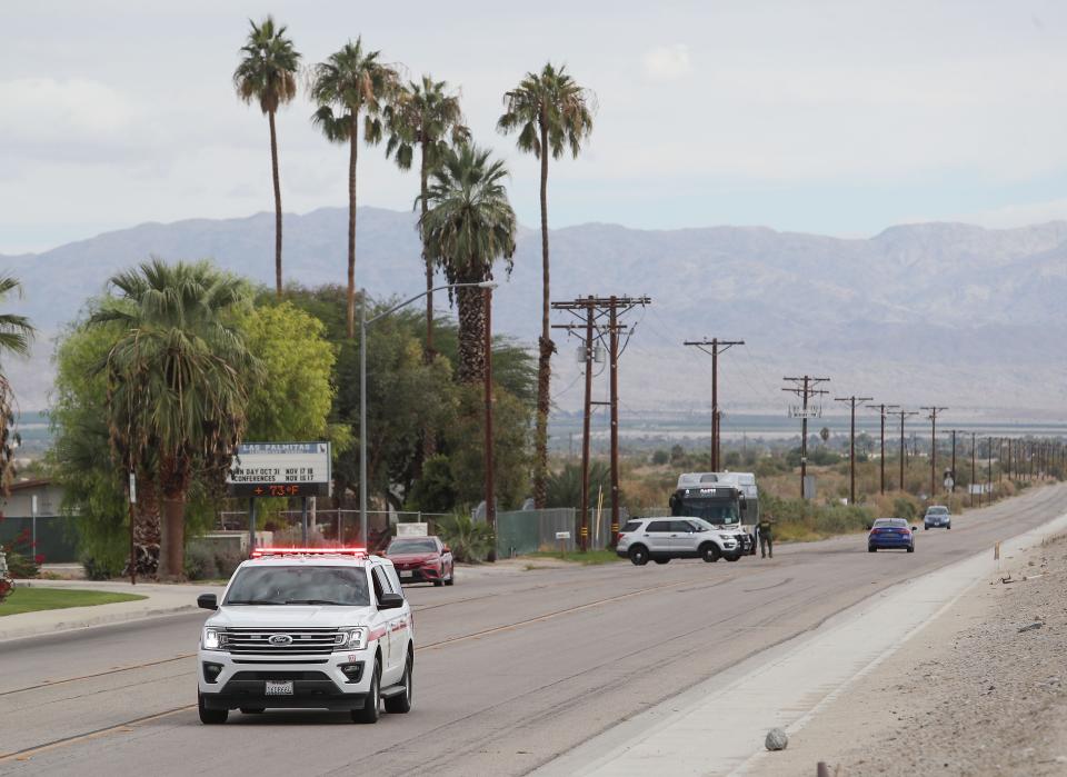 Police officers block the roads around Toro Canyon Middle School and Desert Mirage High School on Wednesday.