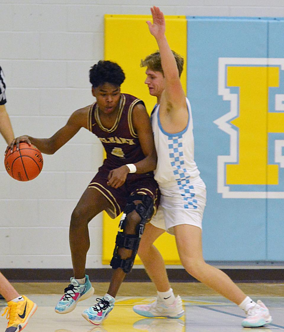 Hamlin's Dawson Noem defends against Milbank's Yohana Ajwanga during a high school boys-girls basketball doubleheader on Thursday, Dec. 21, 2023 at the Hamlin Education Center. Hamlin's boys won 63-43.