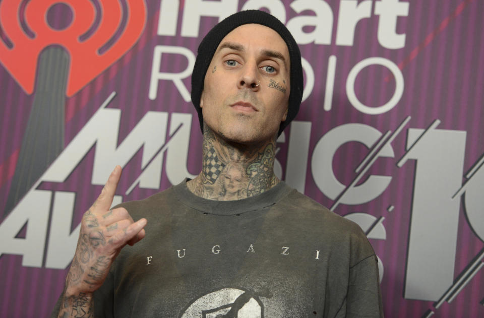 Travis Barker poses in the press room at the iHeartRadio Music Awards on Thursday, March 14, 2019, at the Microsoft Theater in Los Angeles. (Photo by Jordan Strauss/Invision/AP)