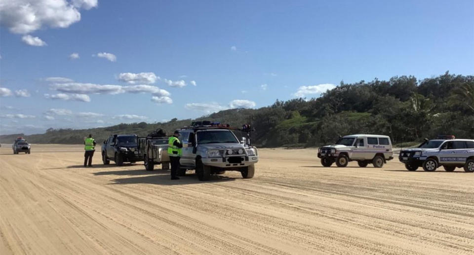 Police stop vehicles for breath tests on Fraser Island.