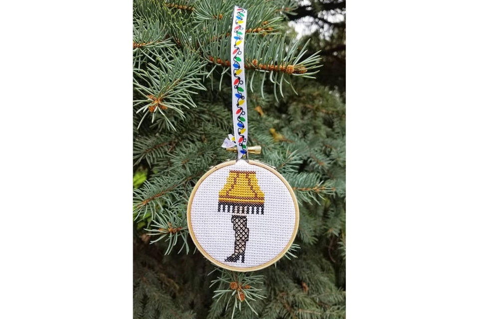 <p>The next best thing to the actual leg lamp from the classic movie is this cute-as-a-button cross-stitched ornament. And maybe Santa will leave you a replica of the lamp under the tree… if you haven’t been naughty. <strong><a rel="nofollow noopener" href="https://www.etsy.com/listing/564562493/leg-lamp-ornament-christmas-story" target="_blank" data-ylk="slk:Buy here;elm:context_link;itc:0;sec:content-canvas" class="link ">Buy here</a></strong> </p>