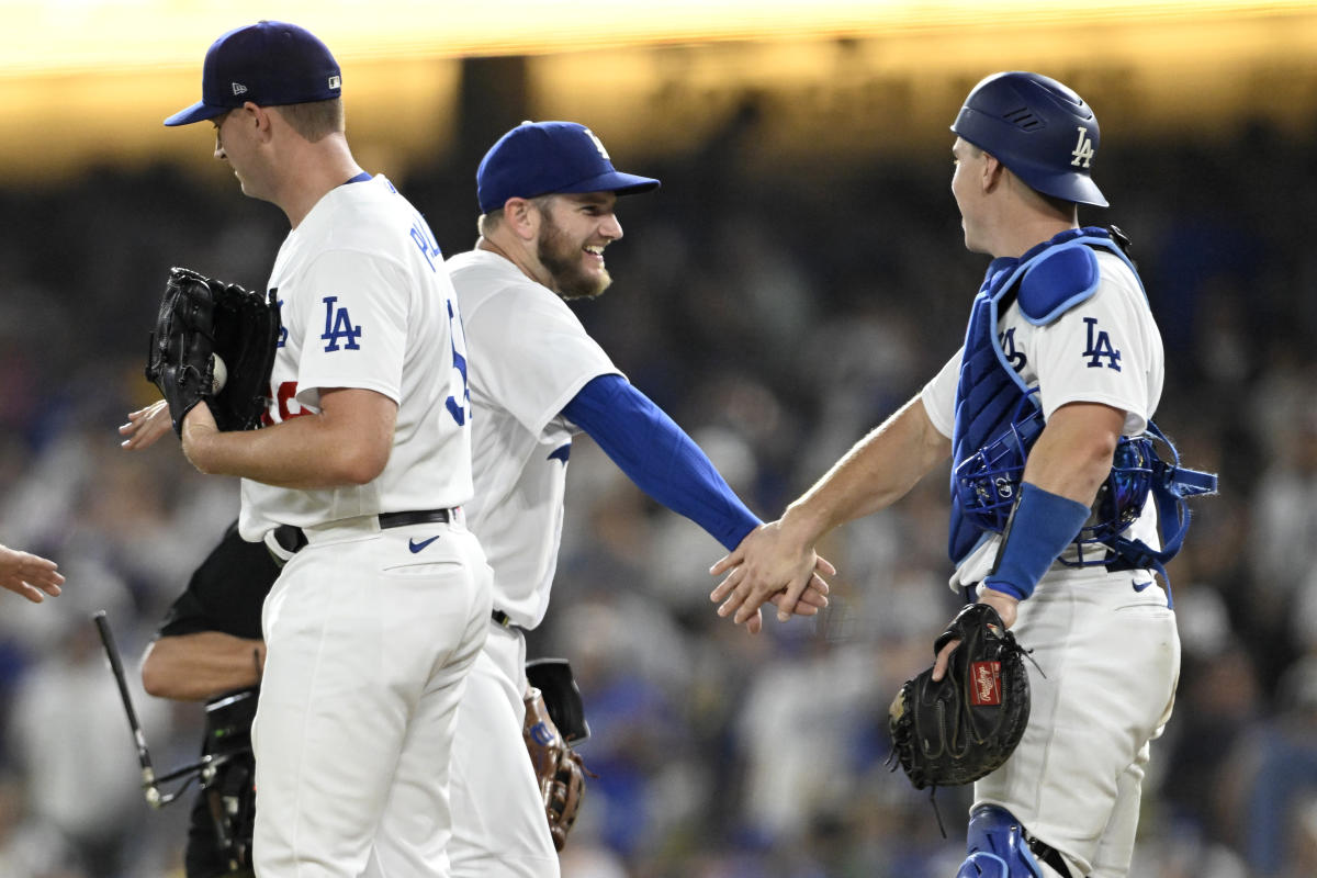 LOS ANGELES, CA - JULY 29: Los Angeles Dodgers Pitcher Emmet Sheehan (80)  gets ready to throw a pitch during the MLB game between the Cincinnati Reds  and the Los Angeles Dodgers