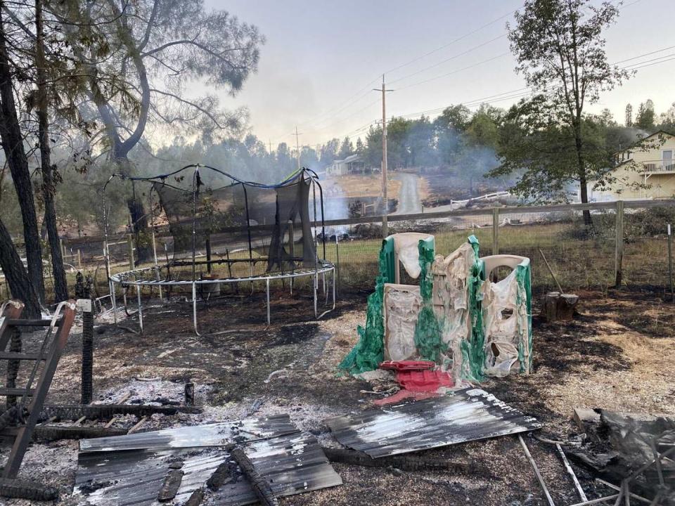 A backyard in the Chicago Park area west of Colfax, California, is seen burned by the River Fire, Thursday, Aug. 5, 2021.