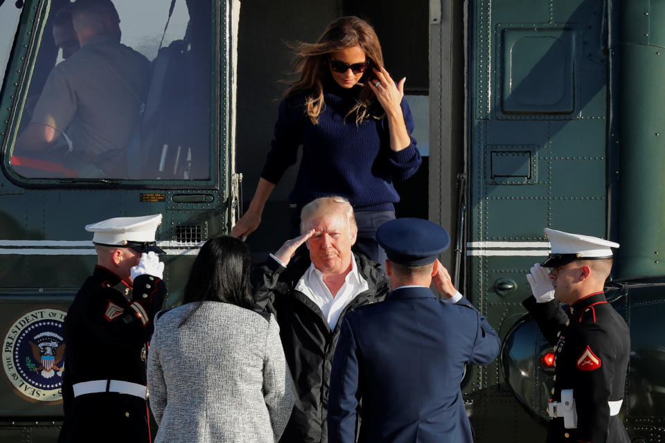 <p>President Donald Trump salutes as he and first lady Melania Trump arrive to board Air Force One for travel to Puerto Rico, to survey hurricane damage, from Joint Base Andrews, Md., Oct. 3, 2017. (Photo: Jonathan Ernst/Reuters) </p>