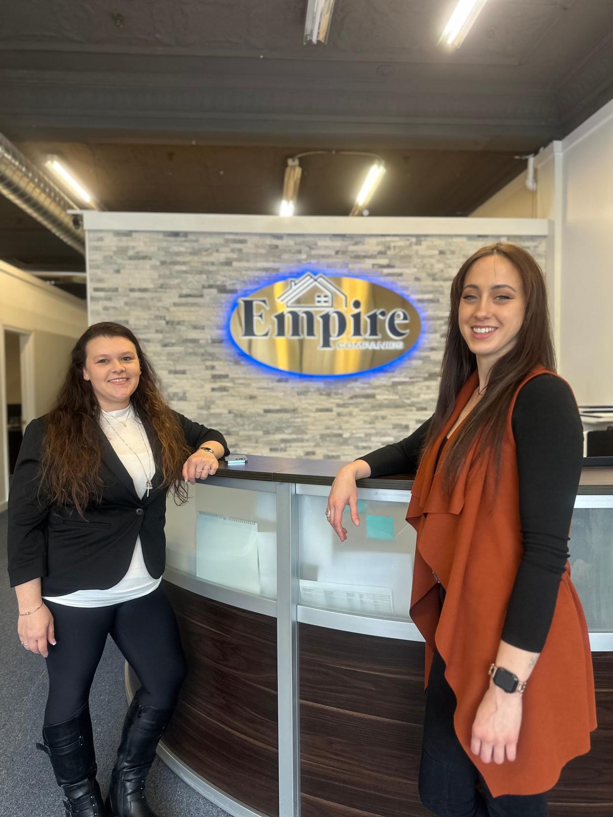 Jenna Hartman, left, and Gabrielle Surette of Empire Management in Gardner. The property management business is celebrating its 30th anniversary.