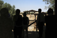 Tourists visit Al-Maghtas, known as Bethany Beyond the Jordan, on the east bank of the Jordan River in Jordan on Wednesday, June 8, 2022. UNESCO has declared Bethany Beyond the Jordan a World Heritage Site. The river holds significance as the scene of miracles in the Old Testament and the site of Christ’s baptism. (AP Photo/Raad Adayleh) (Took out the last sentence).