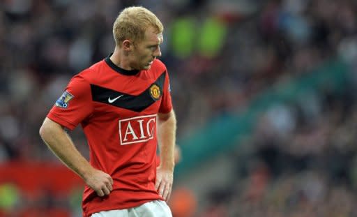 Manchester United midfielder Paul Scholes, during a match against Stoke City at Old Trafford last year. Scholes is to retire from football with immediate effect and will join the club's coaching staff