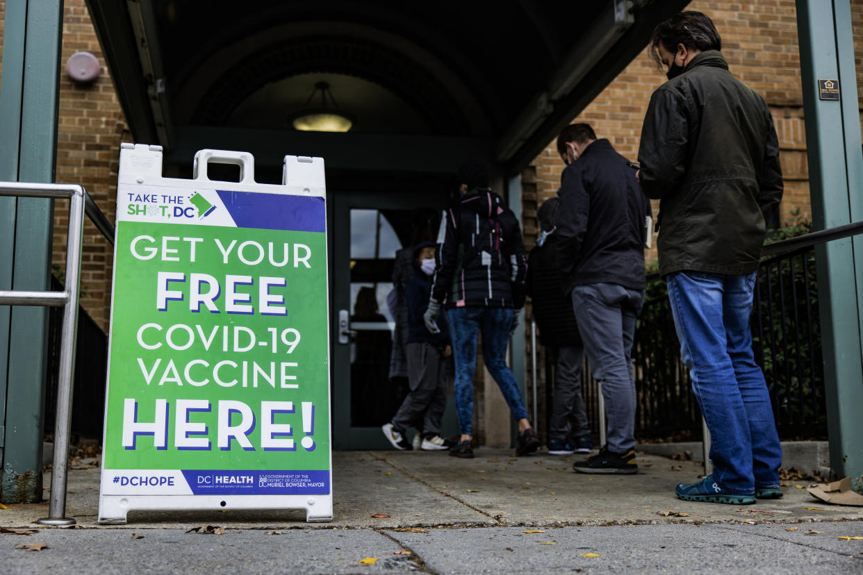 People line up for a free COVID-19 vaccination 