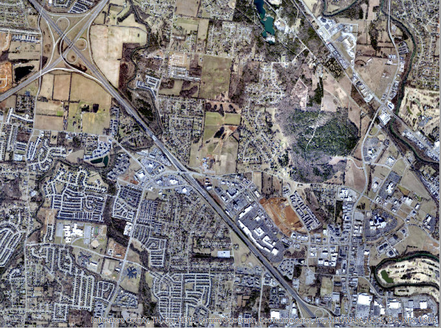 This 2023 aerial view shows Williamson Family Farm in the center and surrounded by development in Murfreesboro's fast-growing Medical Center Parkway area.