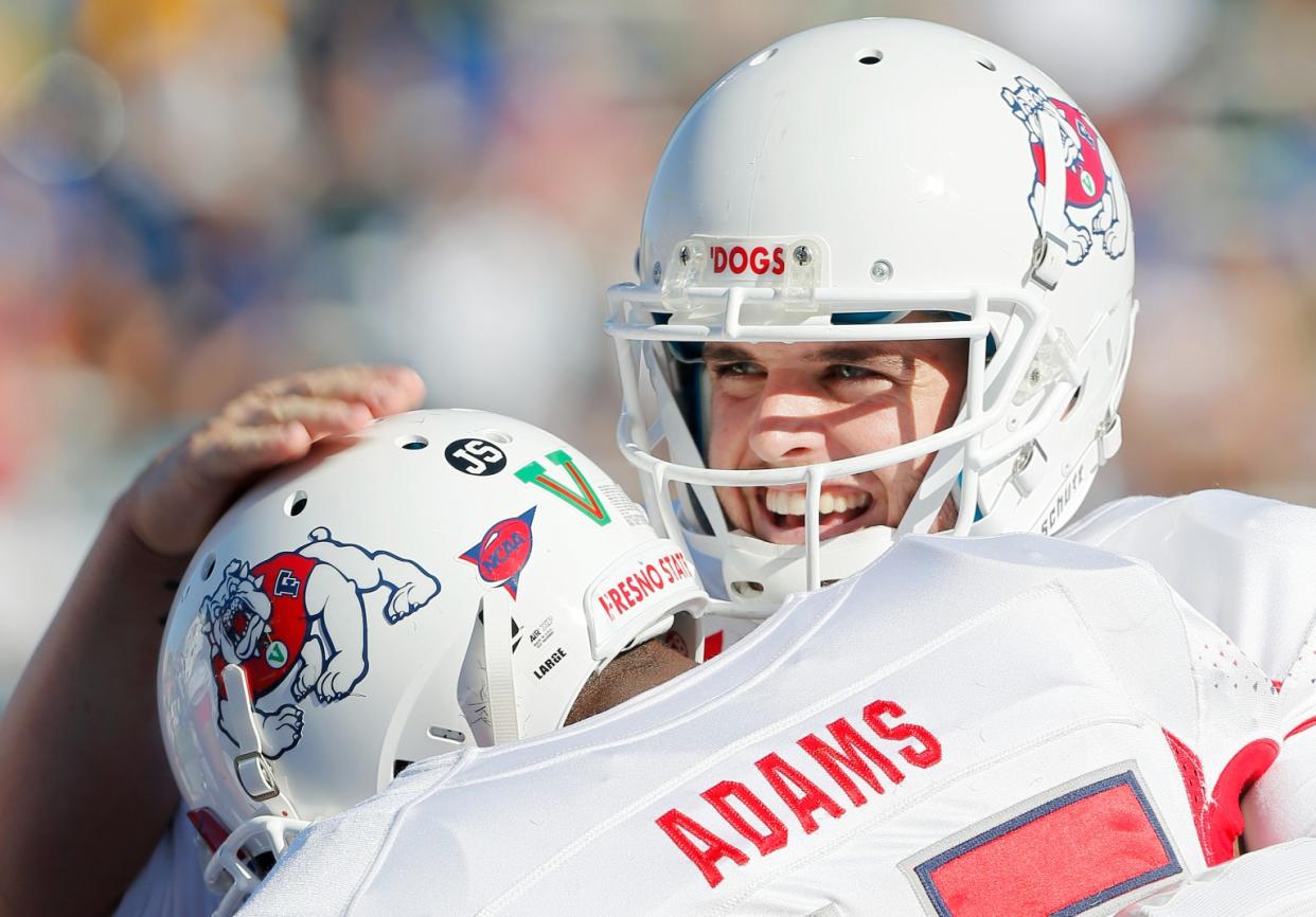 While at Fresno State, Derek Carr, right, and Davante Adams were among the most potent quarterback-receiver connections in college football. (Photo by Brian Bahr/Getty Images)