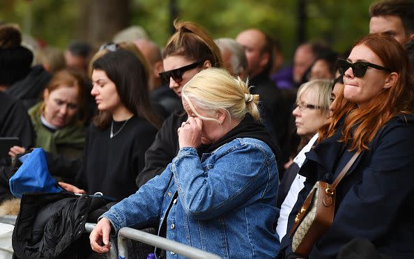 LONDON, ENGLAND - SEPTEMBER 19: Mourners at Westminster Abbey for the State Funeral of Queen Elizabeth II on September 19, 2022 in London, England. Elizabeth Alexandra Mary Windsor was born in Bruton Street, Mayfair, London on 21 April 1926. She married Prince Philip in 1947 and ascended the throne of the United Kingdom and Commonwealth on 6 February 1952 after the death of her Father, King George VI. Queen Elizabeth II died at Balmoral Castle in Scotland on September 8, 2022, and is succeeded by her eldest son, King Charles III.  (Photo by Anthony Devlin/Getty Images)