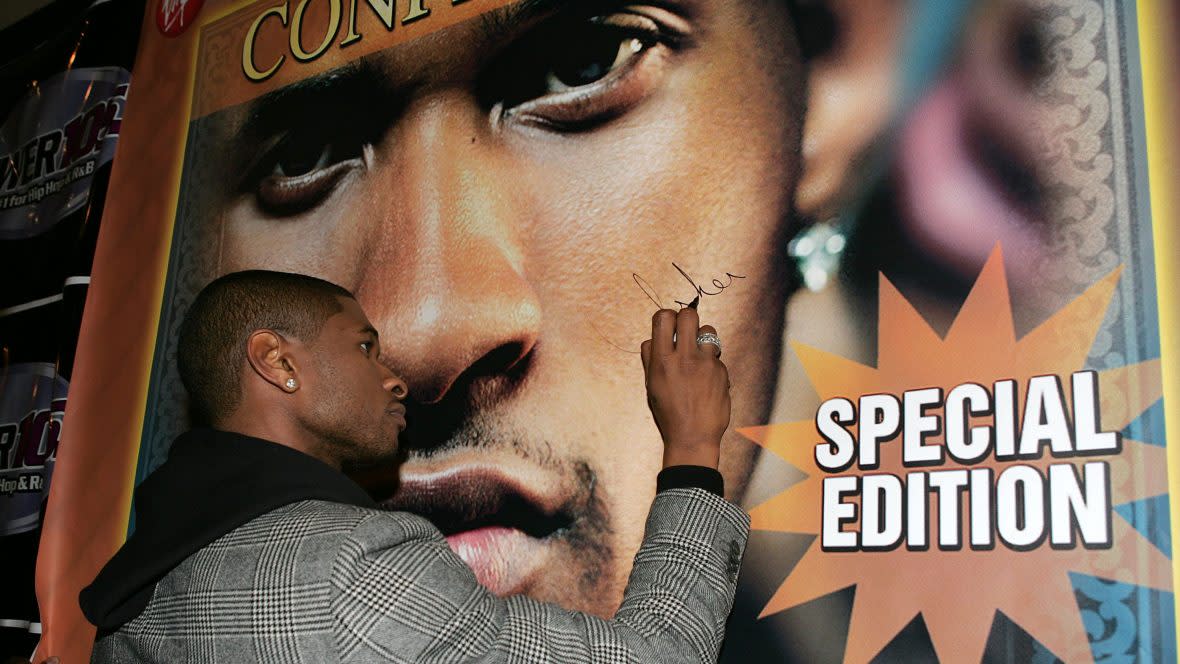 Singer Usher at the Virgin Megastore Union Square in New York City, October 4, 2004 to sign copies of his new CD, "Confessions" Special Edition. The original Confessions CD has sold over 9 million copies worldwide. (Photo by Frank Micelotta/Getty Images)