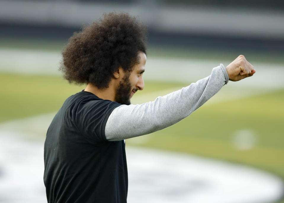 Free agent quarterback Colin Kaepernick participates in a workout for NFL football scouts and media, Saturday, Nov. 16, 2019, in Riverdale, Ga. (AP Photo/Todd Kirkland)