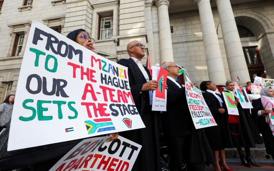 Legal fraternity and members of the public picket outside the Western Cape High court for the success of the South African Government's genocide case