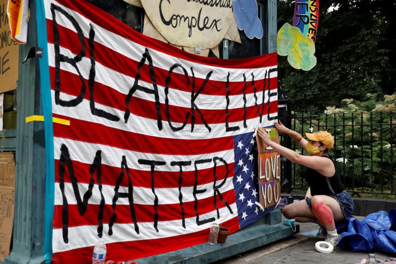 FILE PHOTO: "Defund the Police" protests at the City Hall Autonomous Zone near City Hall in Manhattan, New York City