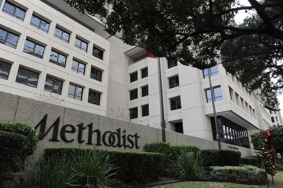 Trees and shrubs line the street in front of Methodist Hospital in Houston's Medical Center Thursday, Nov. 29, 2012. Former President George H.W. Bush is at Methodist for treatment of a lingering cough. (AP Photo/Pat Sullivan)