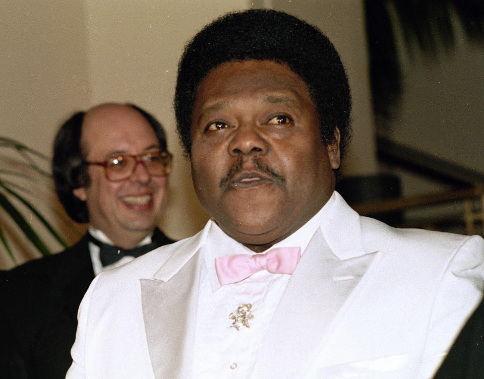 FILE - Rock 'n' roll's Antonio "Fats" Domino is seen in 1986. The New Orleans street where one of the founders of rock ‘n’ roll spent most of his life is being renamed Saturday, Oct. 15, 2022, in his honor. (AP Photo/File)