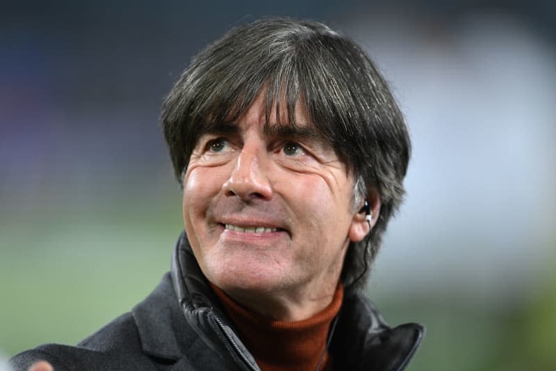 Former German national coach Joachim Loew reacts before the start of the 2022 FIFA World Cup European Qualifiers Group J soccer match between Germany and Liechtenstein at the Volkswagen Arena. Loew has ruled out a coaching job at Bayern Munich, but said he would like to return to the international stage in two years at the latest. Swen Pförtner/dpa