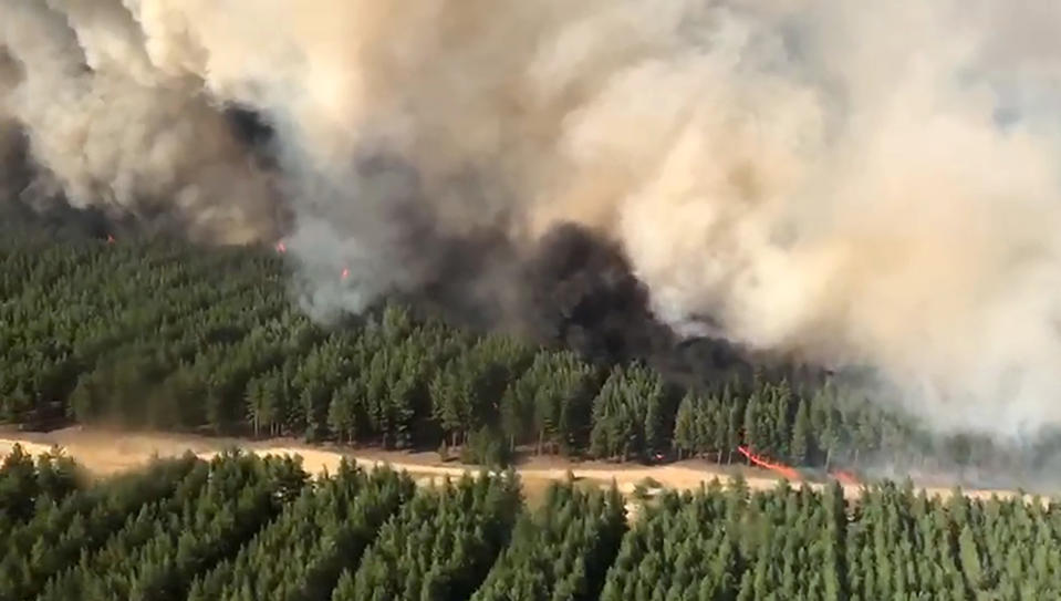 ROSTOV-ON-DON REGION, RUSSIA - SEPTEMBER 2, 2020: An aerial view of a wildfire in Belokalitvinsky District; the fire spread to 20 country houses in the Pioner gardening partnership. Four wildfires cover an area of around 16 hectares in several districts of the region. Best quality available. Video screen grab/Russian Emergencies Ministry/TASS THIS IMAGE HAS BEEN SUPPLIED BY A THIRD PARTY. EDITORIAL USE ONLY (Photo by Emercom\TASS via Getty Images)