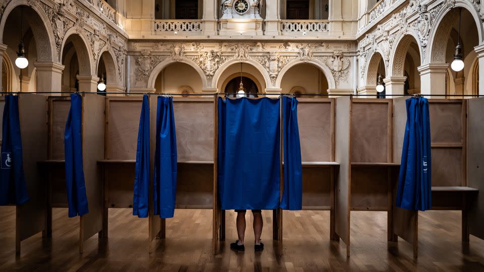 Polls will close at 8 p.m. local time (2 p.m. ET) Sunday. - Jeff Pachoud/AFP/Getty Images