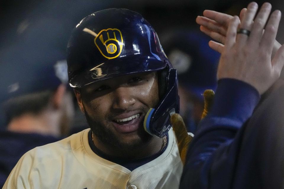 Milwaukee Brewers' Jackson Chourio is congratulated after hitting a two-run home run during the second inning of a baseball game against the San Diego Padres Monday, April 15, 2024, in Milwaukee. (AP Photo/Morry Gash)