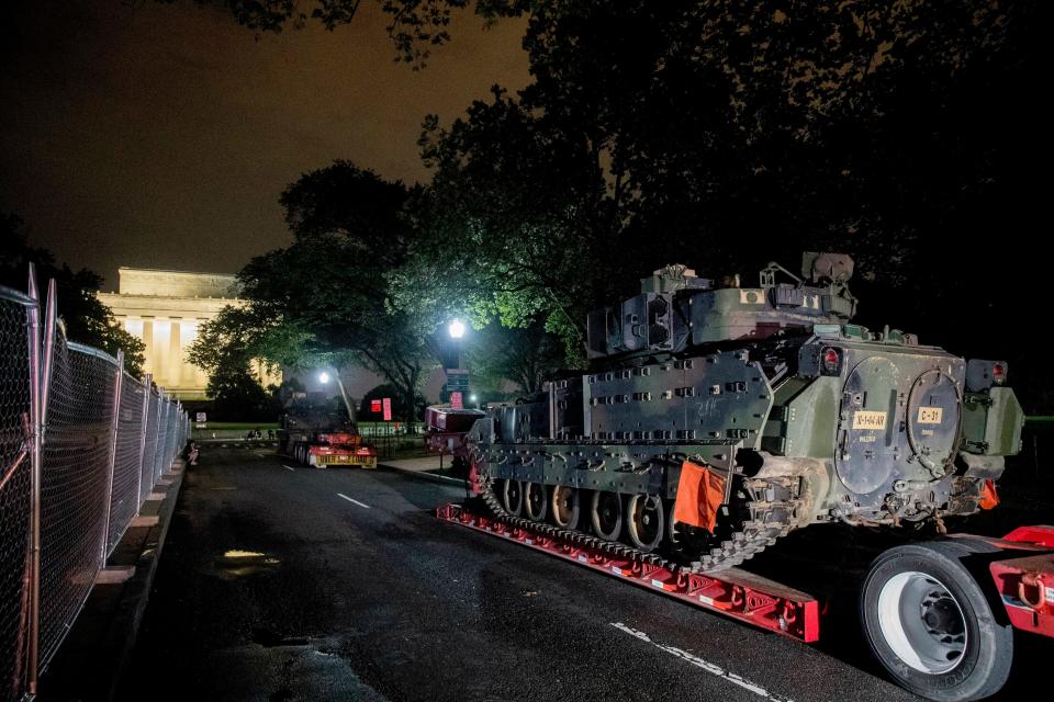 Two Bradley Fighting Vehicles are parked next to the Lincoln Memorial before President Donald Trump's "Salute to America," event honoring service branches on Independence Day.