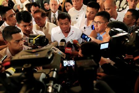 Philippine President Rodrigo Duterte is interviewed by reporters after the handover of a draft law of the Bangsamoro Basic Law (BBL) in a ceremony at the Malacanang presidential palace in metro Manila, Philippines July 17, 2017. REUTERS/Romeo Ranoco