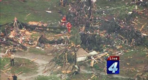 Emergency crews search amid the destruction after a tornado ripped through Twin Lakes in Oklahoma. Credit: AFP