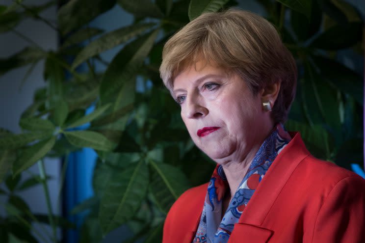 A BBC reporter has apologised after commenting on Theresa May's make-up last night [Photo: PA Images]