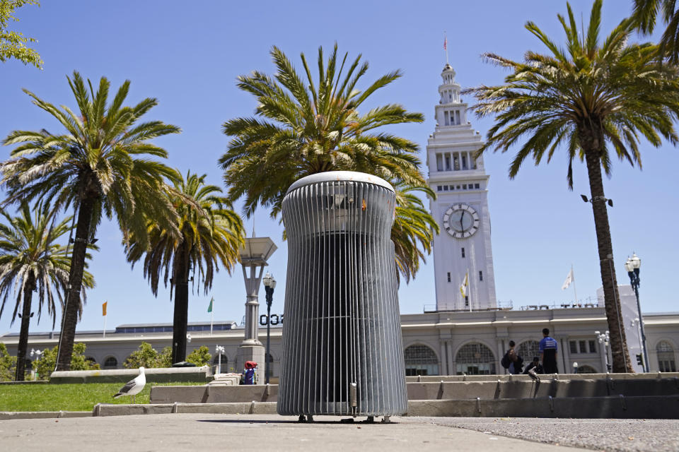 A prototype trash can called Salt and Pepper is seen near the Embarcadero and Ferry Building in San Francisco on July 26, 2022. What takes years to make and costs more than $20,000? A trash can in San Francisco. The pricey, boxy bin is one of three custom-made trash cans the city is testing this summer as part of its yearslong search for another tool to fight its battle against dirty streets. (AP Photo/Eric Risberg)