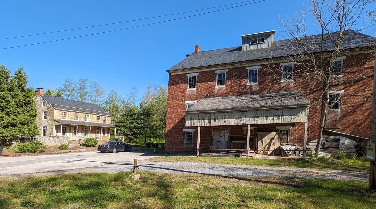 Myers Mill, right, is now part of a future Manchester Township park. The miller's house, at left that was once part of the complex, is now a restored house in private hands.