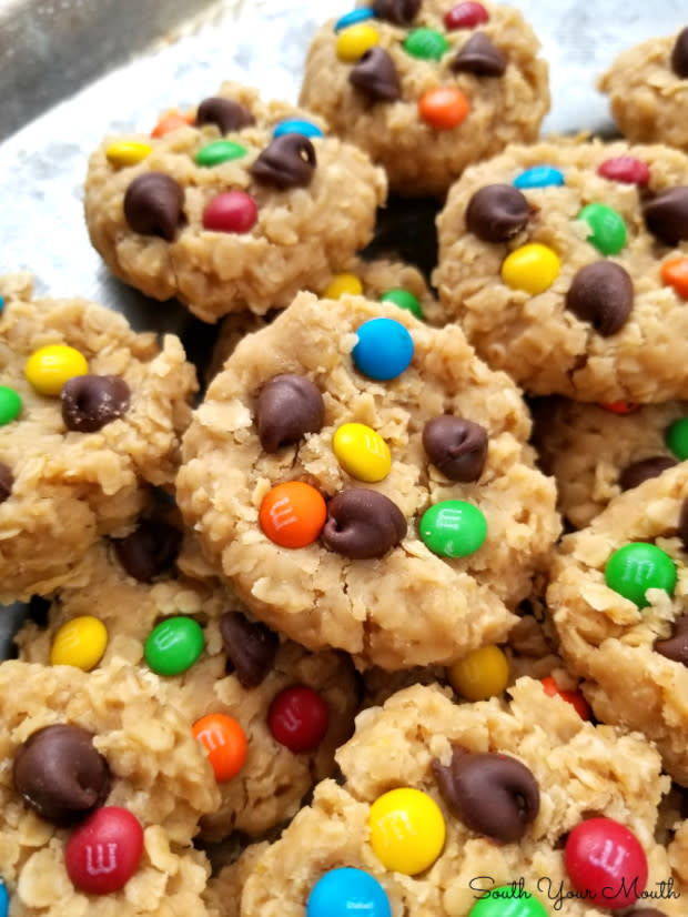 <p>South Your Mouth</p><p>No oven is required for these peanut butter cookies with quick-cooking oats topped with chocolate chips and M&Ms.</p><p><strong>Get the recipe: <a href="https://www.southyourmouth.com/2019/10/no-bake-monster-cookies.html" rel="nofollow noopener" target="_blank" data-ylk="slk:No-Bake Monster Cookies;elm:context_link;itc:0;sec:content-canvas" class="link ">No-Bake Monster Cookies</a></strong></p><p><strong>Related: <a href="https://parade.com/843923/stephaniebrubaker/easy-no-bake-dessert-recipes/" rel="nofollow noopener" target="_blank" data-ylk="slk:27 Best No-Bake Desserts and Treats;elm:context_link;itc:0;sec:content-canvas" class="link ">27 Best No-Bake Desserts and Treats</a></strong></p>